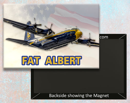 airplane with 'Fat Albert' branding on a fridge magnet set against an American flag background.
