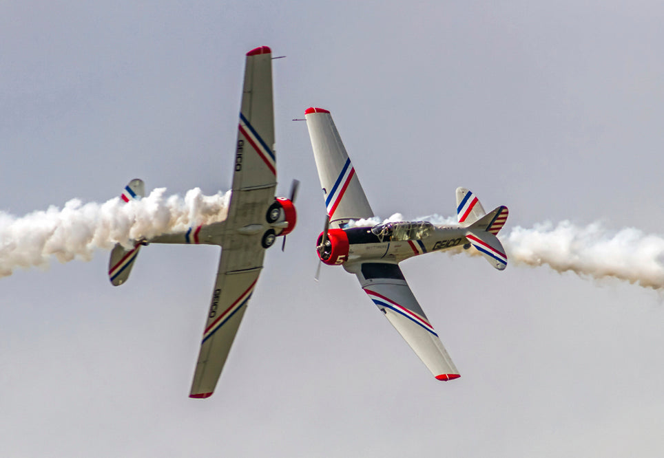 2.25"x3.25" handmade fridge magnet of two nose to nose SNJ-2 military trainer aircraft