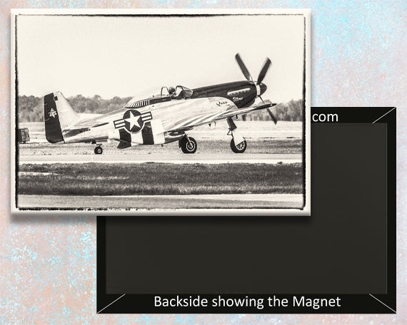 A fridge magnet of the P-51 Mustang military aircraft with a black and white photograph of the airplane.