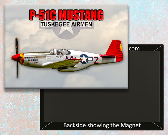 A fridge magnet featuring a P-51C Mustang aircraft with a Tuskegee Airmen inscription.